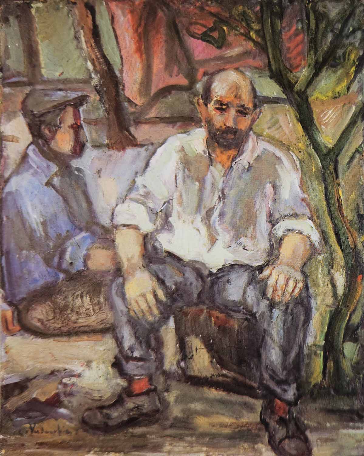 Contadini seduti nell'orto